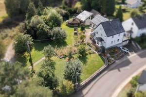 Gepflegtes Ein- bis Zweifamilienhaus mit PV-Anlage auf großem Grundstück in Ortsrandlage – Die vollständige Adresse der Immobilie erhältst du vom Anbieter., 55469 Nannhausen – Vorschaubild 3