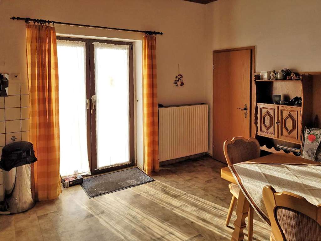 Ensemble von Dreifamilienhaus plus Bau-Grundstück