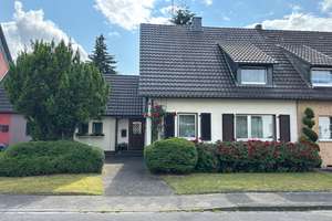 Charmantes Einfamilienhaus mit großem Garten in ruhiger Lage in Düsseldorf-Eller