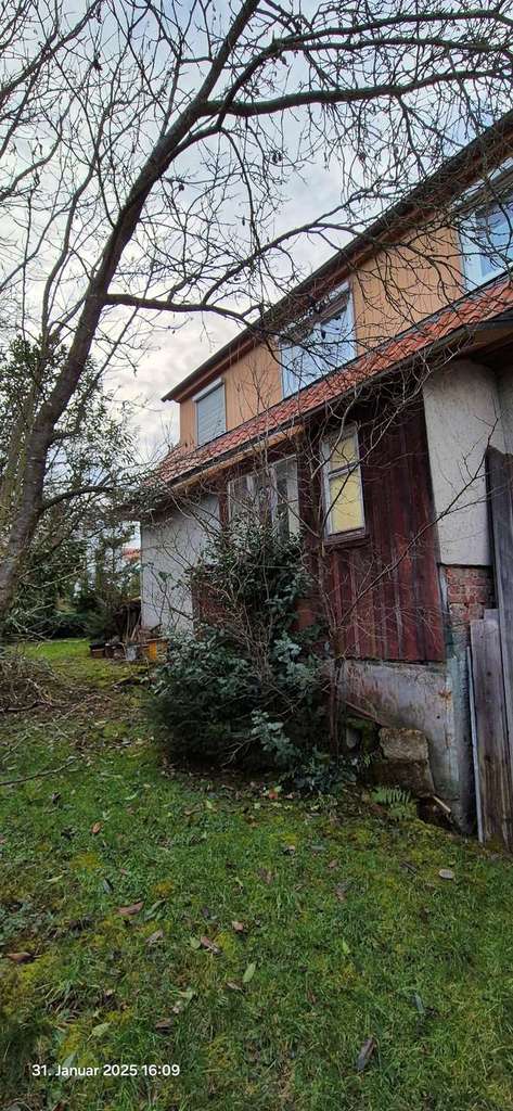 Immobilie in Straubenhardt - Perfekt für Heimwerker - Einfamilienhaus mit großem Anbau - und Garten mit Baufenster - Bild 3