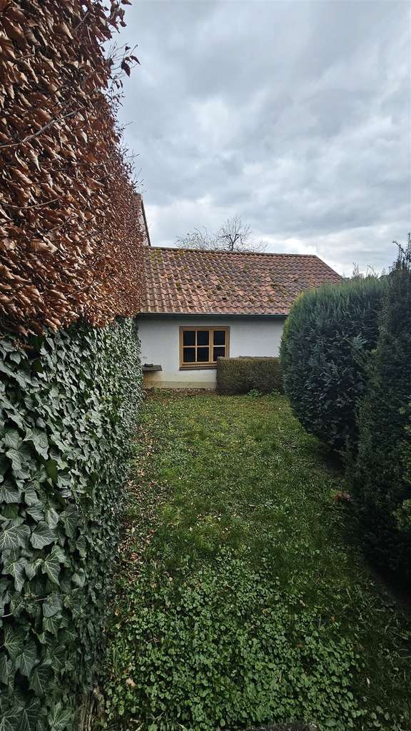 Immobilie in Üchtelhausen - Charmantes Bestandsobjekt mit schönem, terrassiertem Garten und viel Potenzial in Üchtelhausen - Bild 2