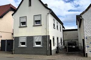 Gepflegtes Einfamilienhaus mit schön angelegtem Garten – Die vollständige Adresse der Immobilie erhältst du vom Anbieter., 67126 Hochdorf-Assenheim – Vorschaubild 1
