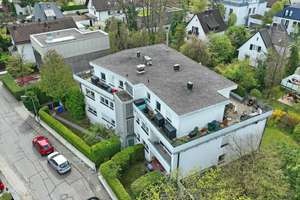 Klassisches Mehrfamilienhaus mit Penthousewohnung in Bestlage von München-Obermenzing