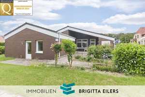 Stilvoller Bungalow mit Kamin, Wintergarten & Gartenidylle in attraktiver Lage von Achim-Baden!