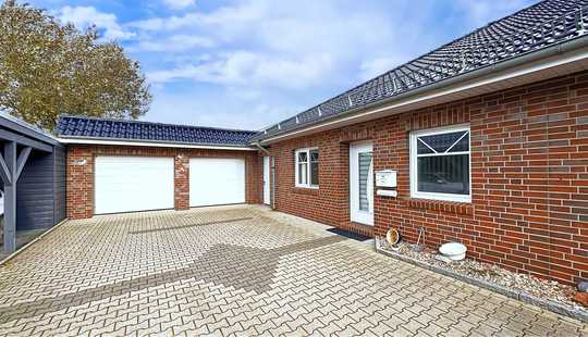 Bild von Ebenerdige Bungalowhälfte mit großer Doppelgarage und integrierter Werkstatt