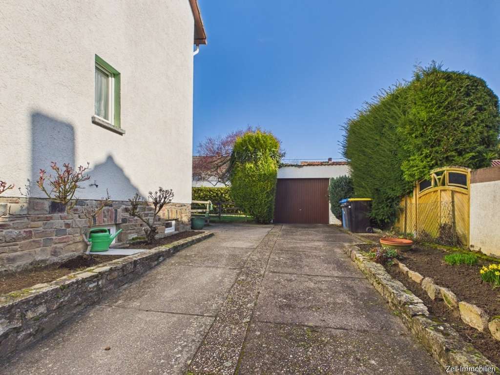 Immobilie in Geisenheim - Doppelhaushälfte zum Wohlfühlen mit schönem Garten in beliebter Wohnlage - Bild 4