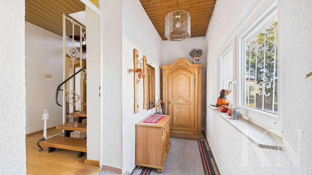 Immobilie in Heusweiler - Geräumiges Einfamilienhaus mit Garten, Garage und vielfältigen Möglichkeiten! - Bild 1