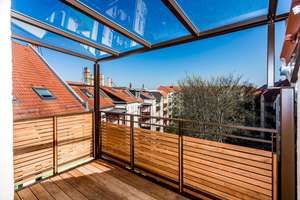 Dachgeschosswohnung mit Wohnküche und Balkon