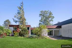 Exklusives Refugium: großzügiger Splitlevel-Bungalow mit Potenzial zur Neugestaltung