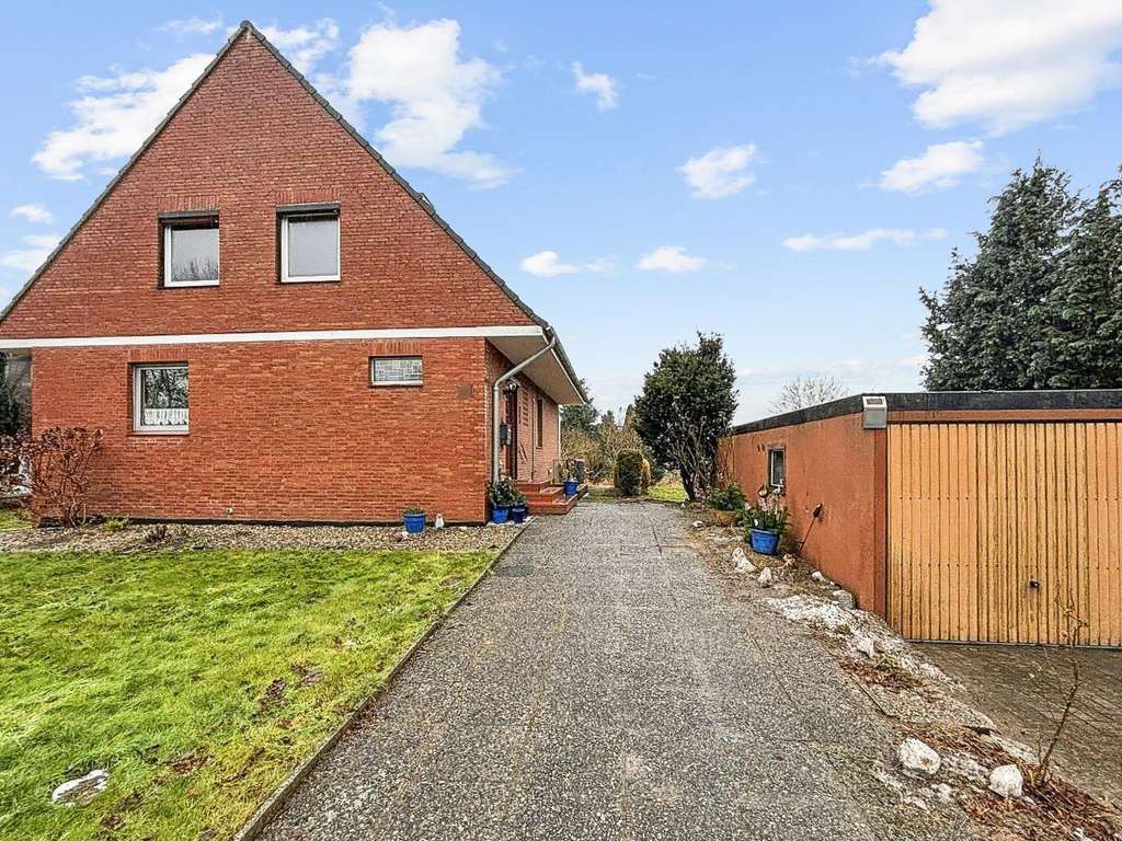 Immobilie in Ratekau - Energieeffizientes Einfamilienhaus in Ovendorf, nur ca. 10 Autominuten von Travemünde entfernt - Bild 1