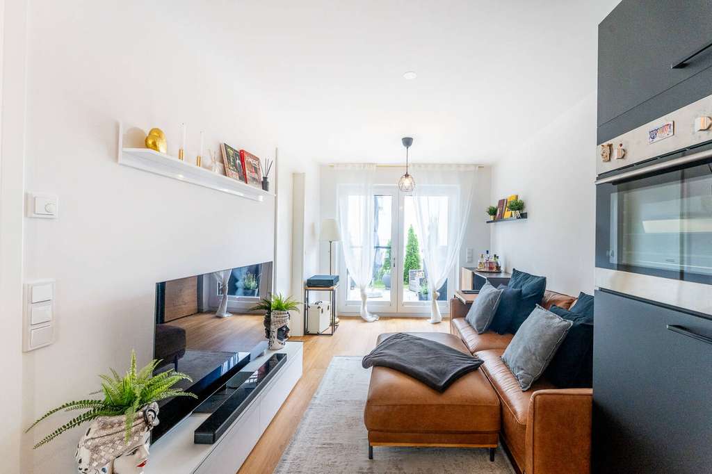 Immobilie in Unterföhring - Nachhaltig beheizt, hochwertig ausgestattet – mit Garten und Terrasse - Bild 1