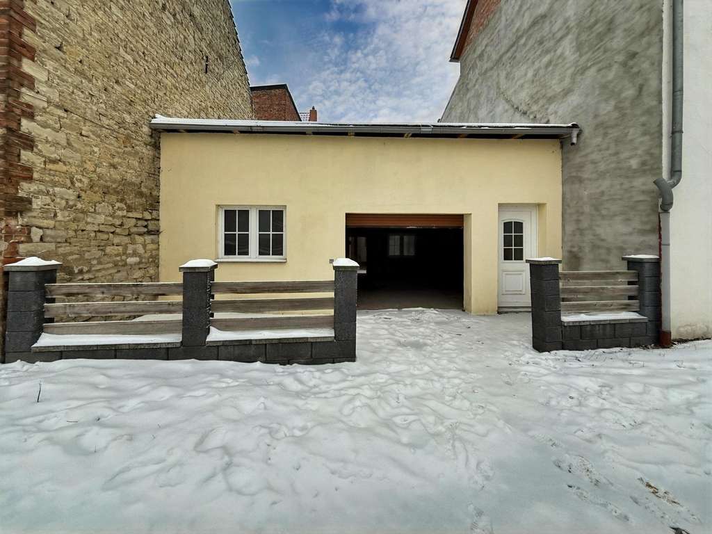 Immobilie in Gröningen - „Kompakt wohnen, großzügig parken – Reihenmittelhaus in Gröningen“ - Bild 1