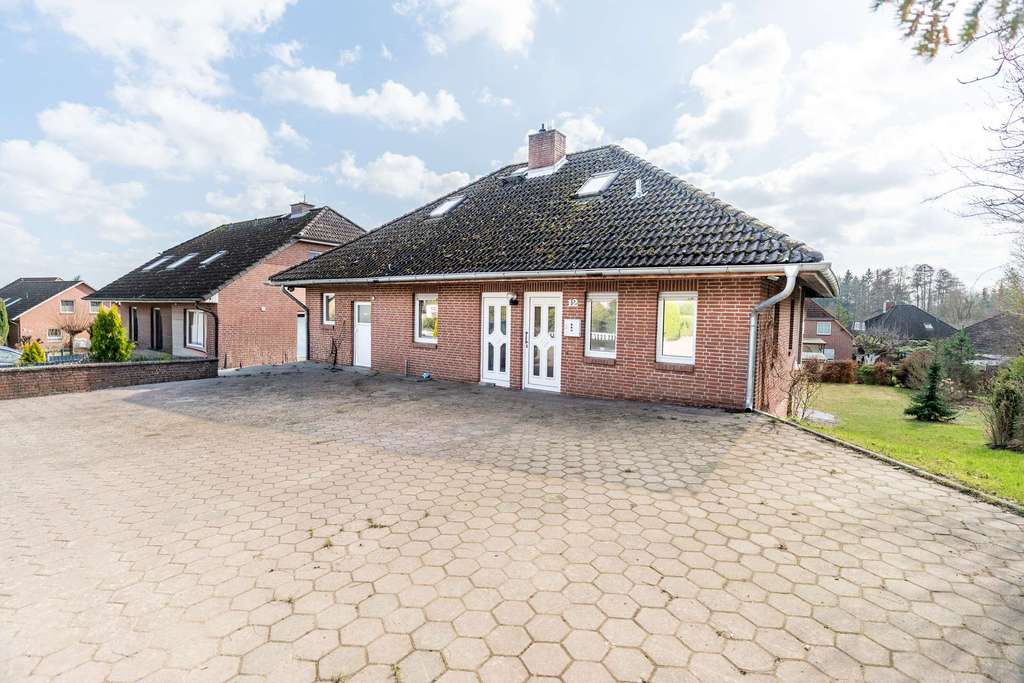 Immobilie in Bad Bodenteich - Natur pur vor der Tür – Einfamilienhaus mit Garten, Kamin und Loggia - Bild 3