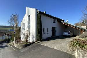 Stilvolles Designhaus mit großzügigem Raumgefühl – Die vollständige Adresse der Immobilie erhältst du vom Anbieter., 97780 Gössenheim – Vorschaubild 2