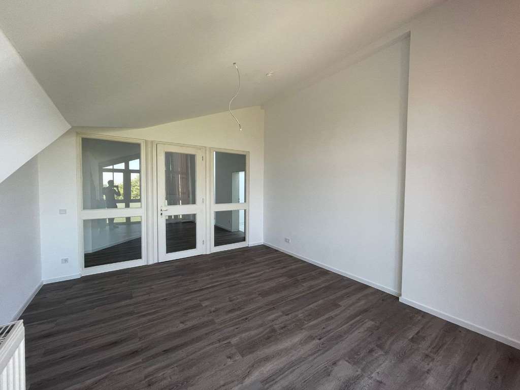 Immobilie in Gilching - Interessantes Wohnen unterm  Dach - Bild 1