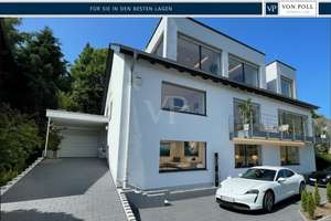 Wohnen auf höchstem Niveau – Stilvolles Einfamilienhaus mit einmaligem Blick, Kamin, Garten