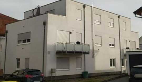 Bild von Modernes Mehrfamilienhaus (BJ 2019) mit Flachdach auf ca. 500 m² Grundstück in Stockstadt am Rhein.