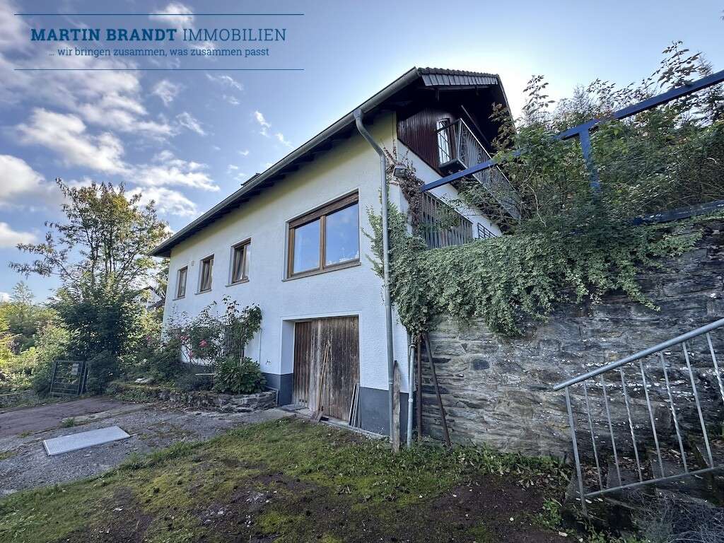 Immobilie in Waldems - Charmantes Einfamilienhaus mit Waldgrundstück ca. 1.958 m² 
in Traumlage von Waldems-Niederems - Bild 1