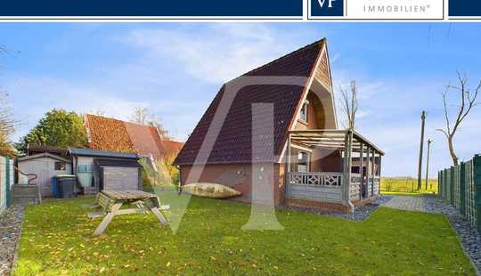 Bild von Gemütliches Sommerhaus am kleinen Meer