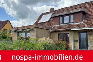 Solarthermie zur Warmwasserversorgung! Teilunterkellerte Doppelhaushälfte mit Garage und Terrasse – Die vollständige Adresse der Immobilie erhältst du vom Anbieter., 24966 Sörup – Vorschaubild 1