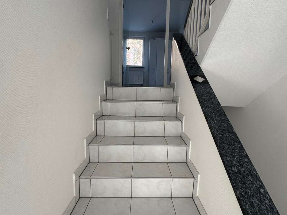 Ebene 1,5, Treppe zu Ebene 2