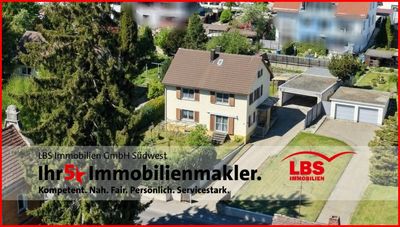 Mitten in Pfullendorf! Gepflegtes Zweifamilienhaus mit großem Garten und Doppelgarage  