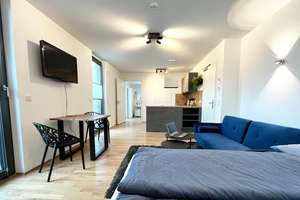 möblierte Neubauwohnung in zentraler Lage