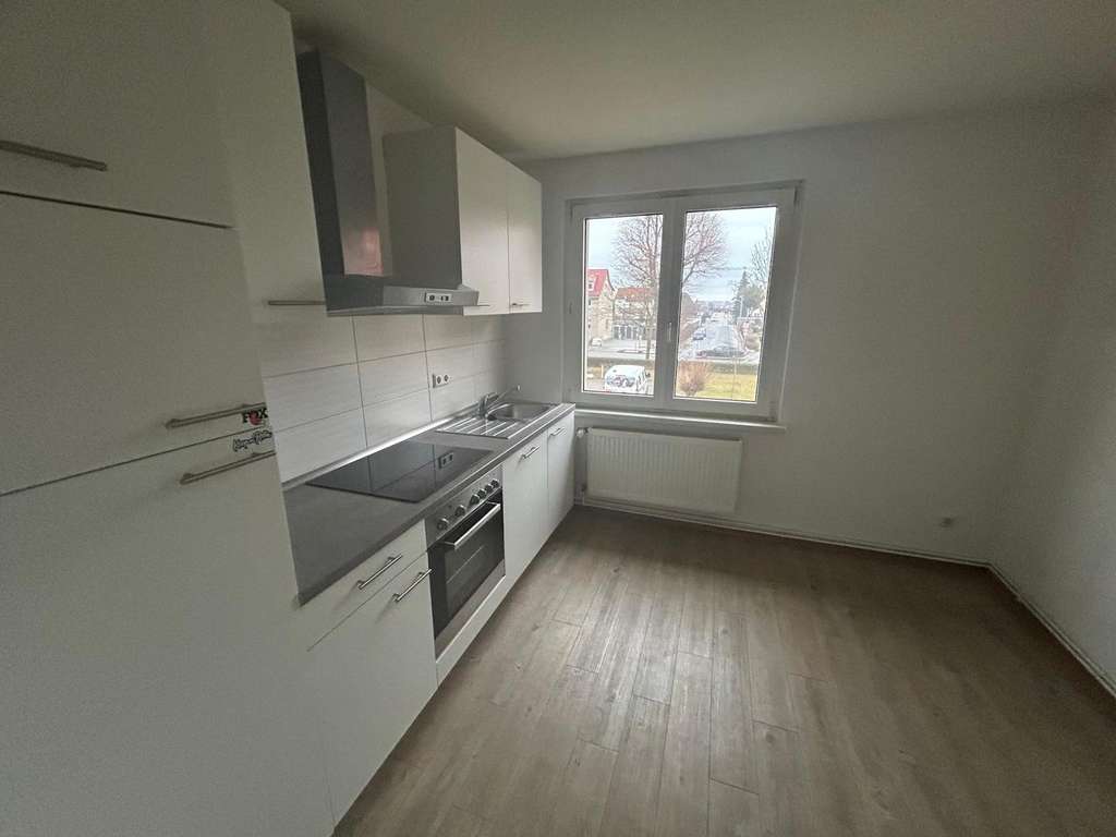 Immobilie in Halberstadt - Gepflegte 2-Zimmer-Eigentumswohnung mit Einbauküche und Außenstellplatz - Bild 1