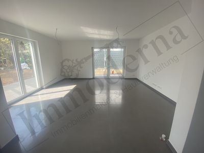 Lichtdurchflutete und moderne 2-Zimmer EG-Wohnung mit Garten