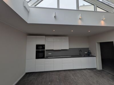 Erstbezug! Neue 5-Zi Wohnung in Rüdesheim mit Einbauküche, Terrasse, und Fußbodenheizung