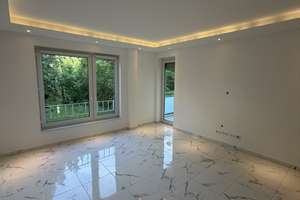 Kernsanierte 3 Zimmer Wohnung mit Gartenanteil, Balkon und Fußbodenheizung!