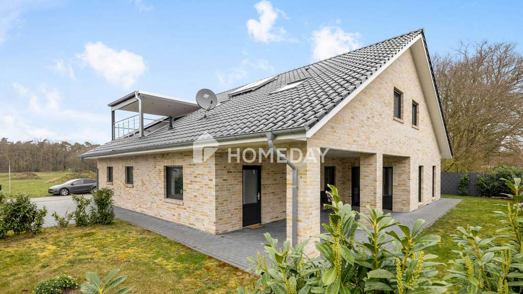 Immobilie in Herzlake - Modernes Einfamilienhaus mit Solar, Fußbodenheizung, Doppelgarage und Gartenidylle - Bild 2