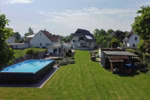 Gartenoase mit Pool: Ein-/Zweifamilienhaus mit Wintergarten nahe Schloß Ulenburg – Herford (Kreis) – Vorschaubild 1