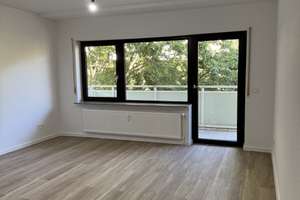 2,5-ZKB-Wohnung Erstbezug nach umfassender Sanierung mit Balkon, Grünblick & Tiefgaragenstellplatz