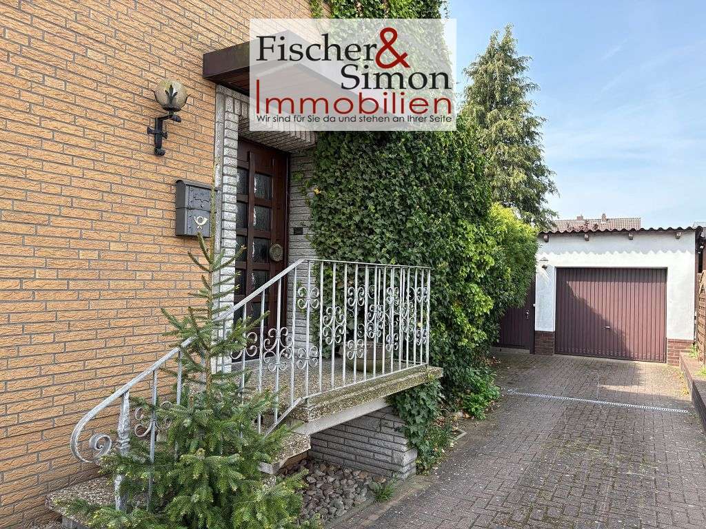 Immobilie in Rehburg-Loccum - Rehburg-Loccum: ansprechendes Einfamilienhaus m. Einliegerwohnung, Keller, Garage u. schönem Garten - Bild 3