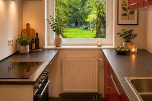 Provisionsfrei neuwertige 3-Zimmer-Wohnung mit Designküche und Gartenblick in Berlin Reinickendorf