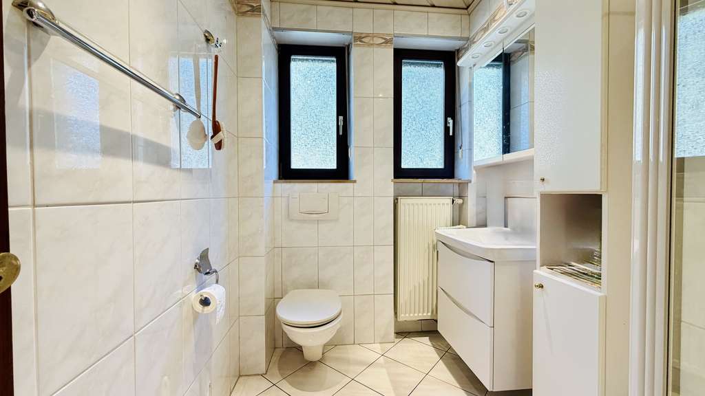 Immobilie in Ottweiler - Freistehendes Einfamilienhaus mit großem Garten und viel Potenzial in Ottweiler! - Bild 4