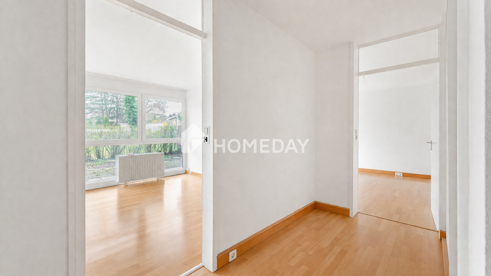 Charmante 2-Zimmer-Erdgeschosswohnung mit Terrasse, Gartenanteil & Tiefgaragenstellplatz, München Kreis – Bild 4