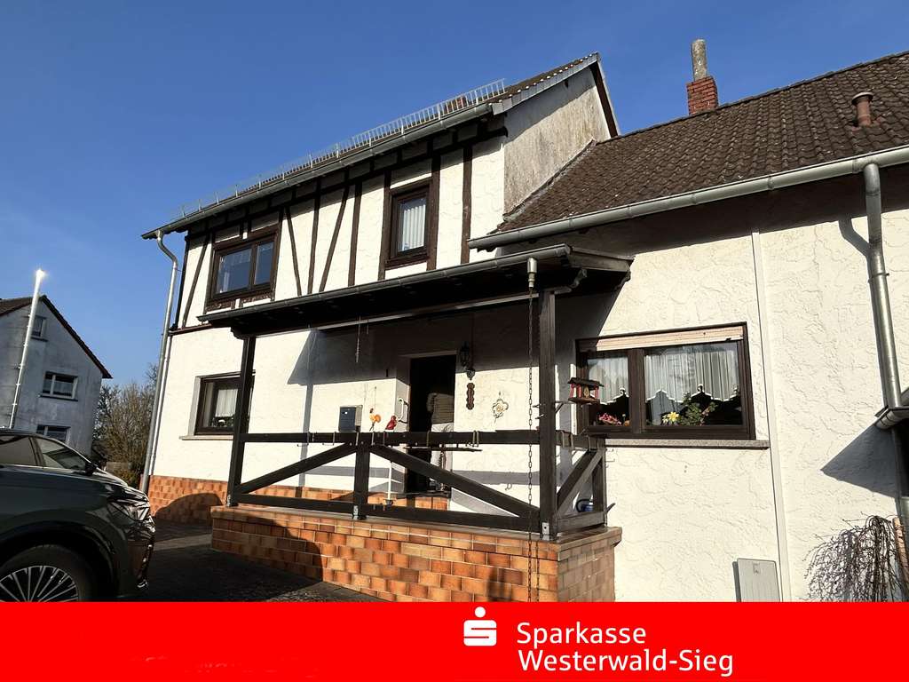 Immobilie in Bürdenbach - Nähe Horhausen, Doppelhaushälfte mit großem Grundstück sowie zusätzlichem Waldgrundstück - Bild 1