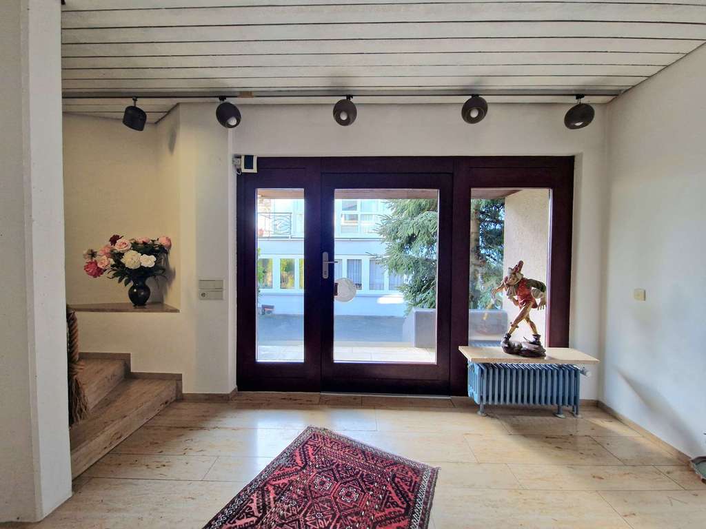 Immobilie in Aichwald - Wohnen & Arbeiten vereint - Haus mit großer Lagerfläche & flexibler Raumaufteilung - Bild 1