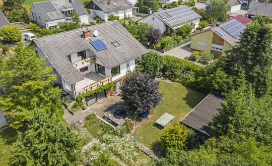 Ihr neues Zuhause in Toplage: Vielseitiges Wohnhaus mit Einliegerwohnung & Gartenparadies
