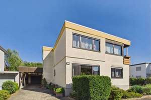 Großzügiges 3-Familienhaus in attraktiver Lage mit idyllischem Garten und Blick ins Grüne