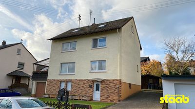 POTENZIAL STATT PERFEKTION – VERMIETETES ZWEIFAMILIENHAUS ZUR SANIERUNG MIT HERRLICHEM WEITBLICK