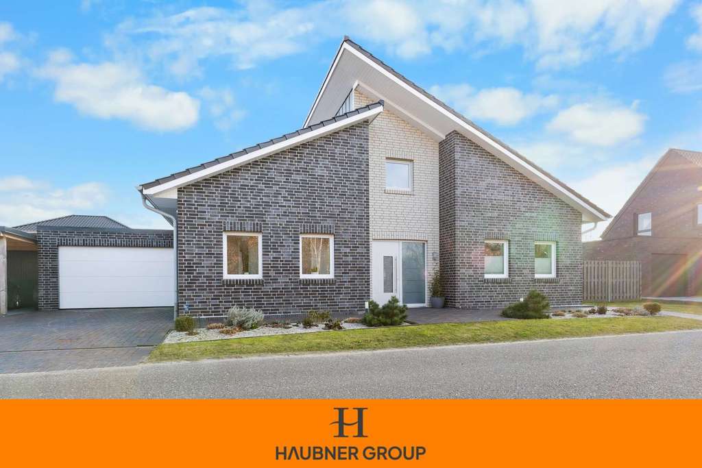 Immobilie in Rhede (Ems) - Seeblick, Ruhe, moderne Architektur – Traumhaus aus 2021 direkt am Spieksee - Bild 0