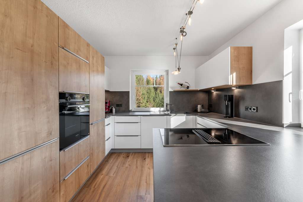 Immobilie in Regen - Charmante Maisonette-Eigentumswohnung mit Gartenanteil und Kachelofen! - Bild 1