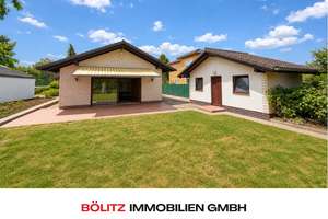 Bungalow direkt am Landschaftspark: 250m² BGF, 5 Zimmer, qualitative Ausstattung, Garage & Garten