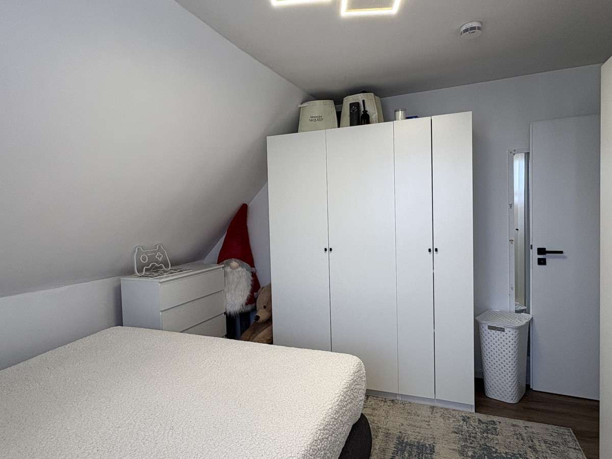 Immobilie in Bad Nenndorf - KARSTEN IMMOBILIEN ermöglicht Ihnen: Moderne DG-Wohnung mit großem Balkon und Top-Ausstattung - Bild 4