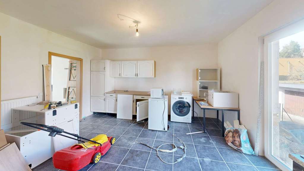 Immobilie in Horbach - HAUF // Einfamilienhaus in Queidersbach mit Anbau, Garten und großem Entwicklungspotenzial - Bild 2