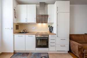 AIGNER - Helle 2-Zimmer-Wohnung mit Loggia in begehrter Lage Nymphenburgs – München – Vorschaubild 4