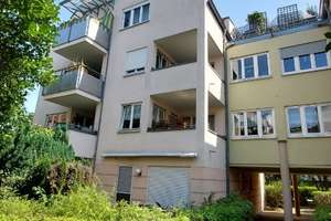 Eigentumswohnung im sehr grün angelegten Wohnpark mit Balkon & Stellplatz zu verkaufen